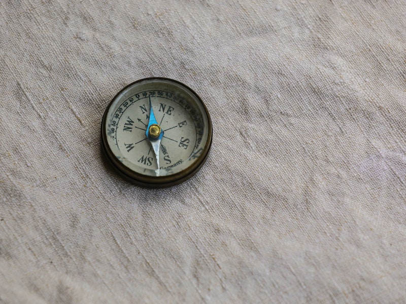 photo-of-a-compass-pointing-north