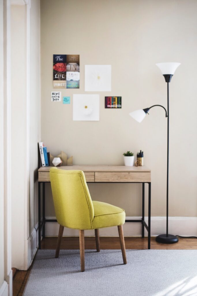 home office setup with yellow desk chair